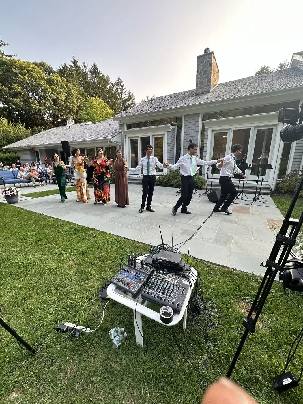 Outdoor event production with audio and video equipment staged on site