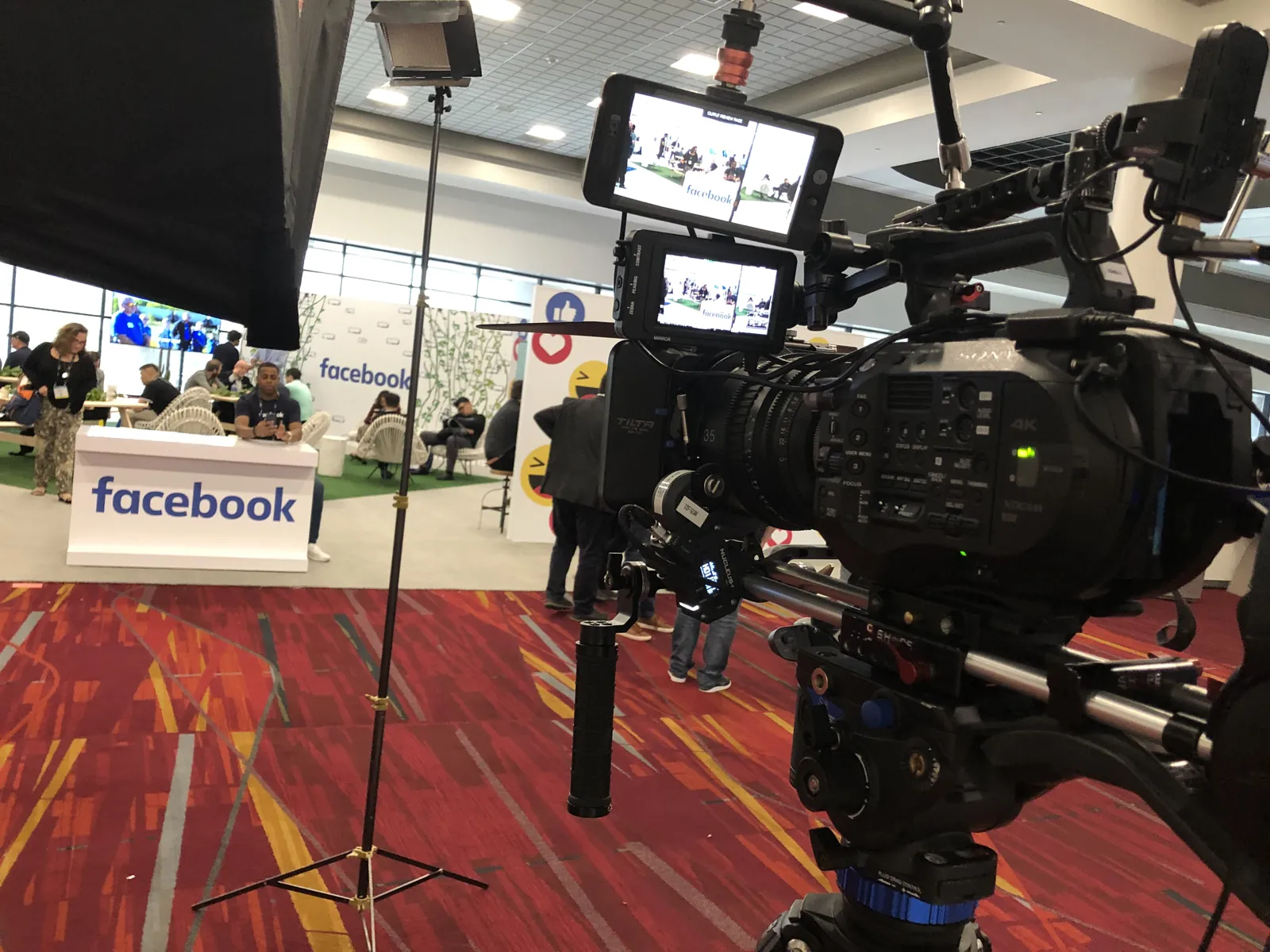 The Transcendent camera position on a branded conference floor in New York