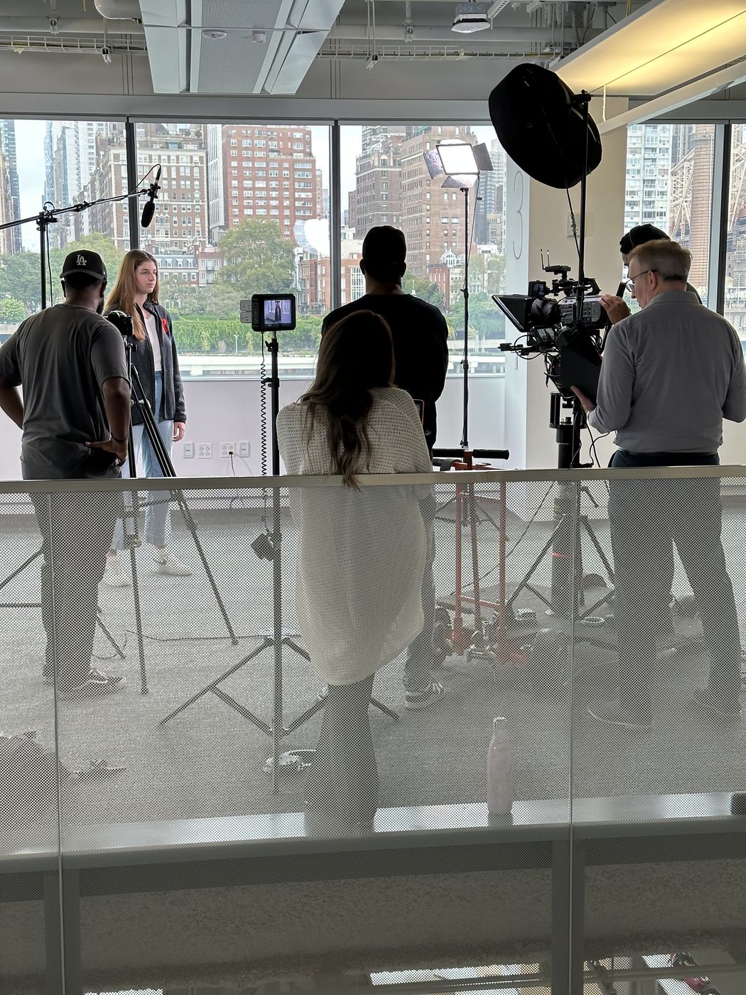 Campus interview production with the Manhattan skyline — higher education video by Transcendent Enterprise