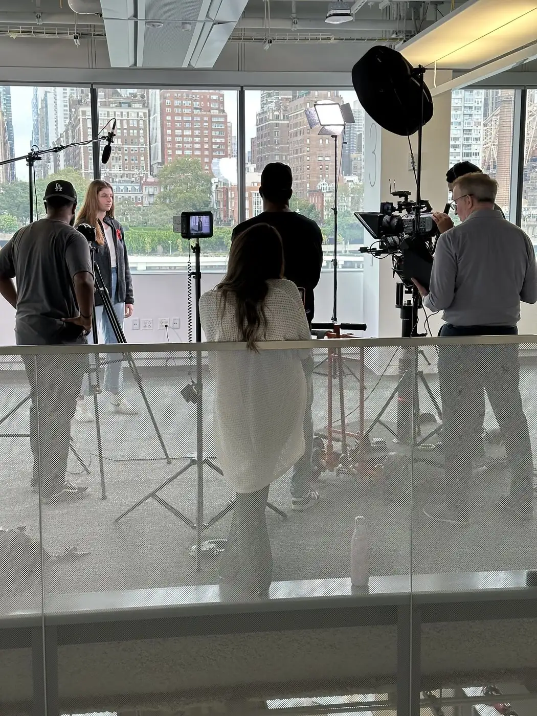 Campus interview production with the Manhattan skyline — higher education video by Transcendent Enterprise