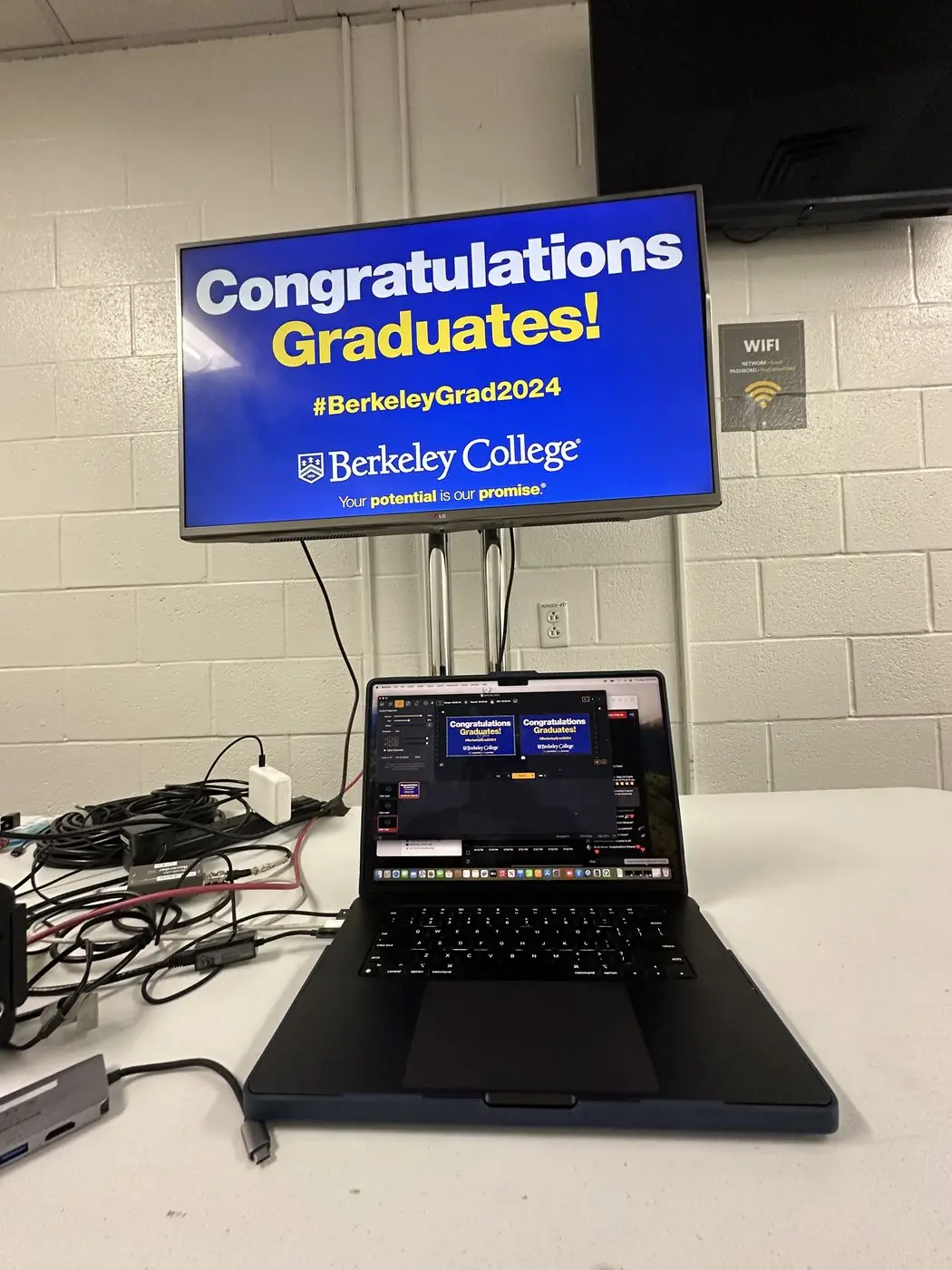 Congratulations Graduates graphics at the livestream switching station for a Berkeley College ceremony