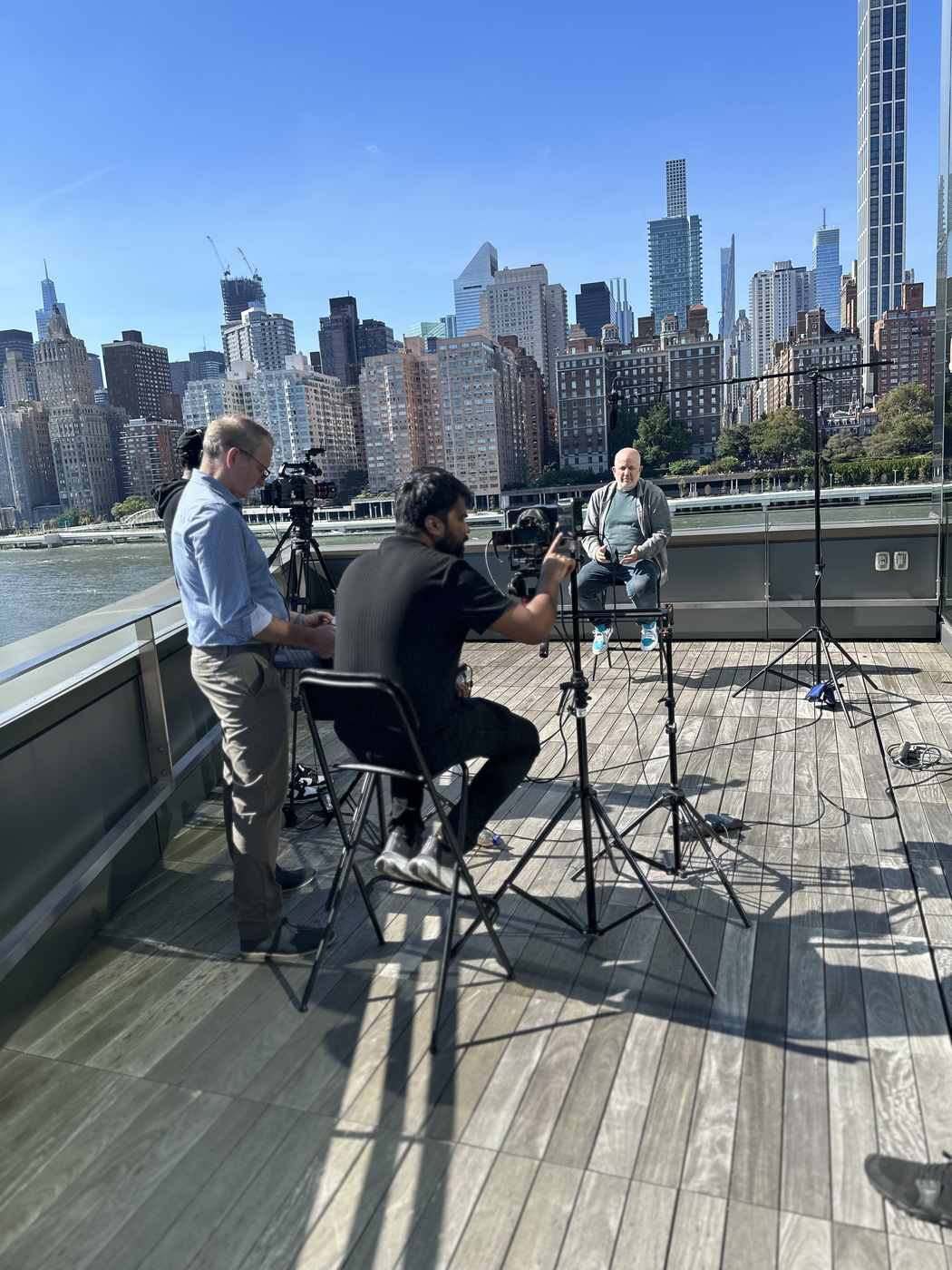 Rooftop executive interview with the Manhattan skyline filmed by Transcendent Enterprise