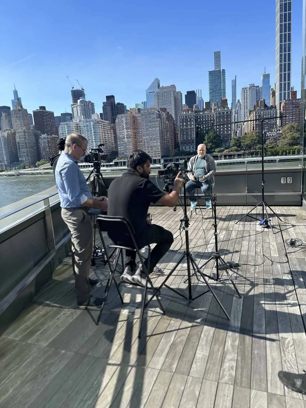 Rooftop executive interview with the Manhattan skyline filmed by Transcendent Enterprise